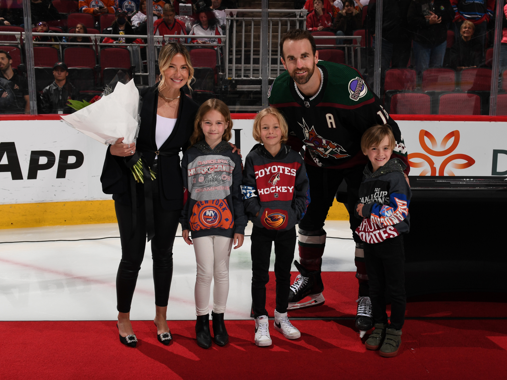 Ladd family at an ice rink